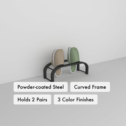 Slipper Storage key features: powder-coated steel, curved-frame design, holds 2 slipper pairs, three color finishes.