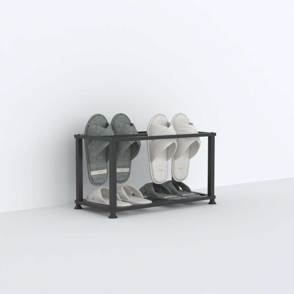 Black Metal Slipper Stand with Double Layer showing two-tier storage for six pairs of slippers in a compact entryway setup.