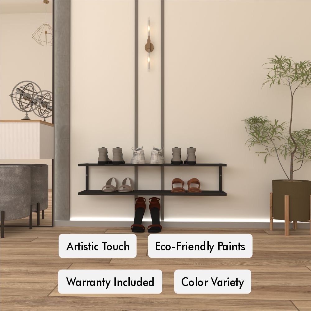2 Tier Metal Shoe Storage shown wall-mounted in a minimalist beige room, holding multiple pairs of shoes with boots arranged on the floor below.