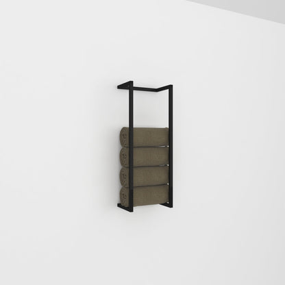 A black modern wall-mounted towel and blanket storage rack holding four neatly rolled green towels, showcased against a plain white wall for a minimalist aesthetic.