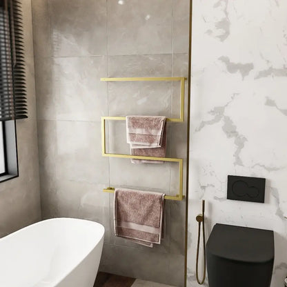 Wall-mounted towel holder on a wall with light grey tiles, holding neatly folded pink towels in an elegant bathroom space.